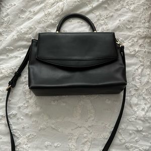 A New Day handbag with snap close
